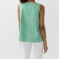 A woman is seen from the back wearing the Ann Mashburn Bell Top, a sleeveless green and white vertically striped Italian poplin, paired with white pants against a plain background.