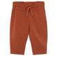A pair of Cozmo Baby Saul Twill Pants in a rust color, featuring an elastic waistband and drawstring, displayed flat on a white background.