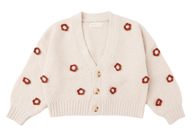 Cozy and cream-colored, the Rylee & Cru Baby Girls' and Girls' Boxy Crop Cardigan features a textured knit, V-neck, three buttons, bubbled sleeves, and scattered red floral patterns.