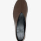 A top view of a single Proenza Schouler Tee Ballet Flat in brown Nappa leather with a black insole, shown on a white background.