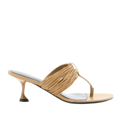 The Proenza Schouler Cable T Strap Sandals feature a tan slip-on design with a thin sole, mid-height heel, and a stylish gathered top strap.