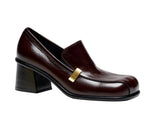 Proenza Schouler Esme Loafer in dark brown Nappa Latex with a square toe, block heel, and a rectangular gold-tone metal accent on the side.
