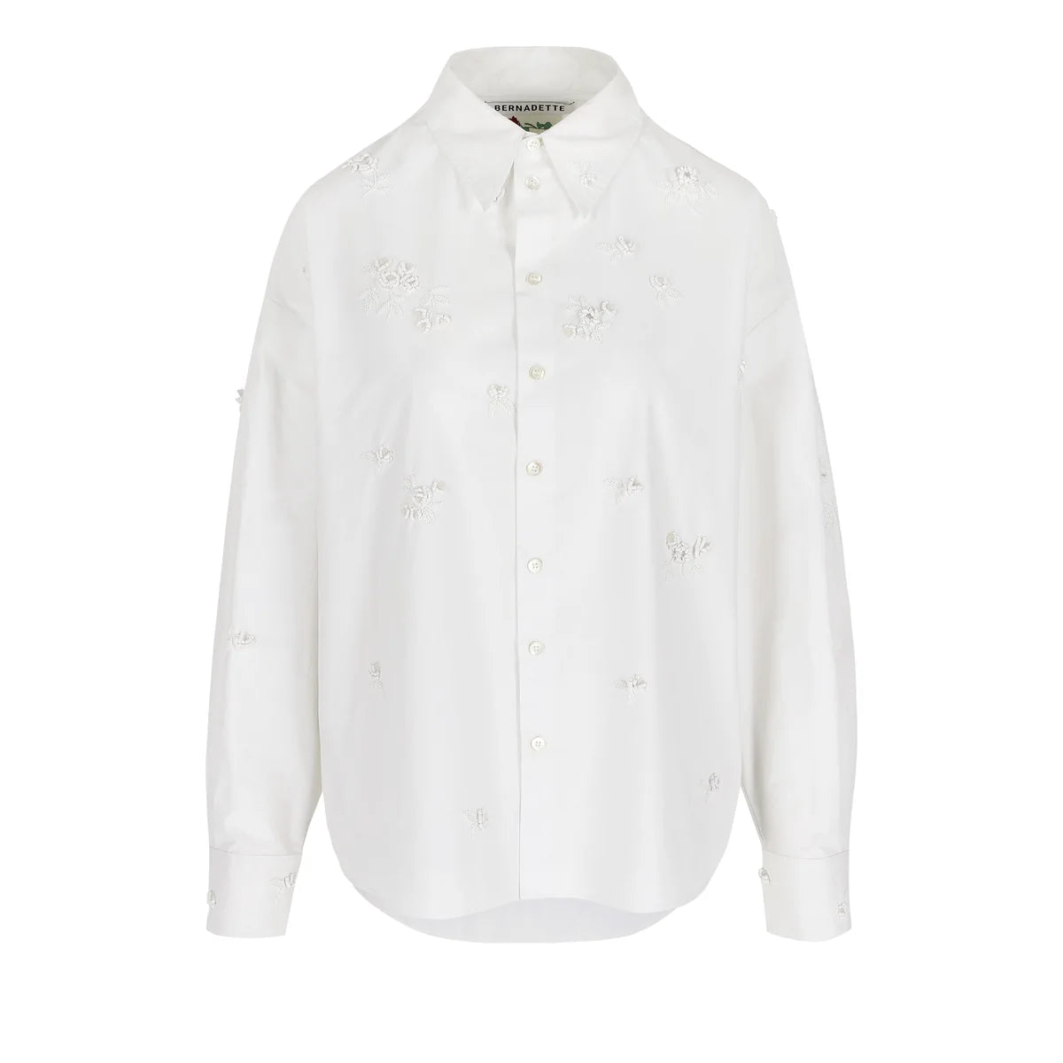 Bernadette Everett Rose Embroidered Shirt, an oversized white button-down featuring scattered tonal rose embroidery.