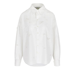 Bernadette Everett Rose Embroidered Shirt, an oversized white button-down featuring scattered tonal rose embroidery.