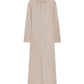The Showtime Cashmere Shirt Dress by Guest in Residence is a lightweight, beige long-sleeve collared shirt dress with a button-down front, shown laid flat on a white background.