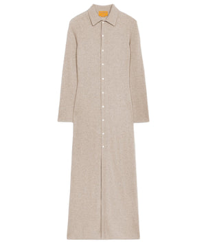 The Showtime Cashmere Shirt Dress by Guest in Residence is a lightweight, beige long-sleeve collared shirt dress with a button-down front, shown laid flat on a white background.