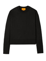 The Guest in Residence Shrunken Crew Cashmere Sweater, a dark green long-sleeve slim fit design, features a crew neckline and ribbed cuffs, crafted from lightweight knit fabric and displayed against a plain white background.