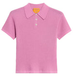 The Shrunken Cashmere Polo by Guest in Residence is a short-sleeve, light purple waffle knit shirt with a ribbed texture, three buttons, and a flat collar, shown on a plain white background.