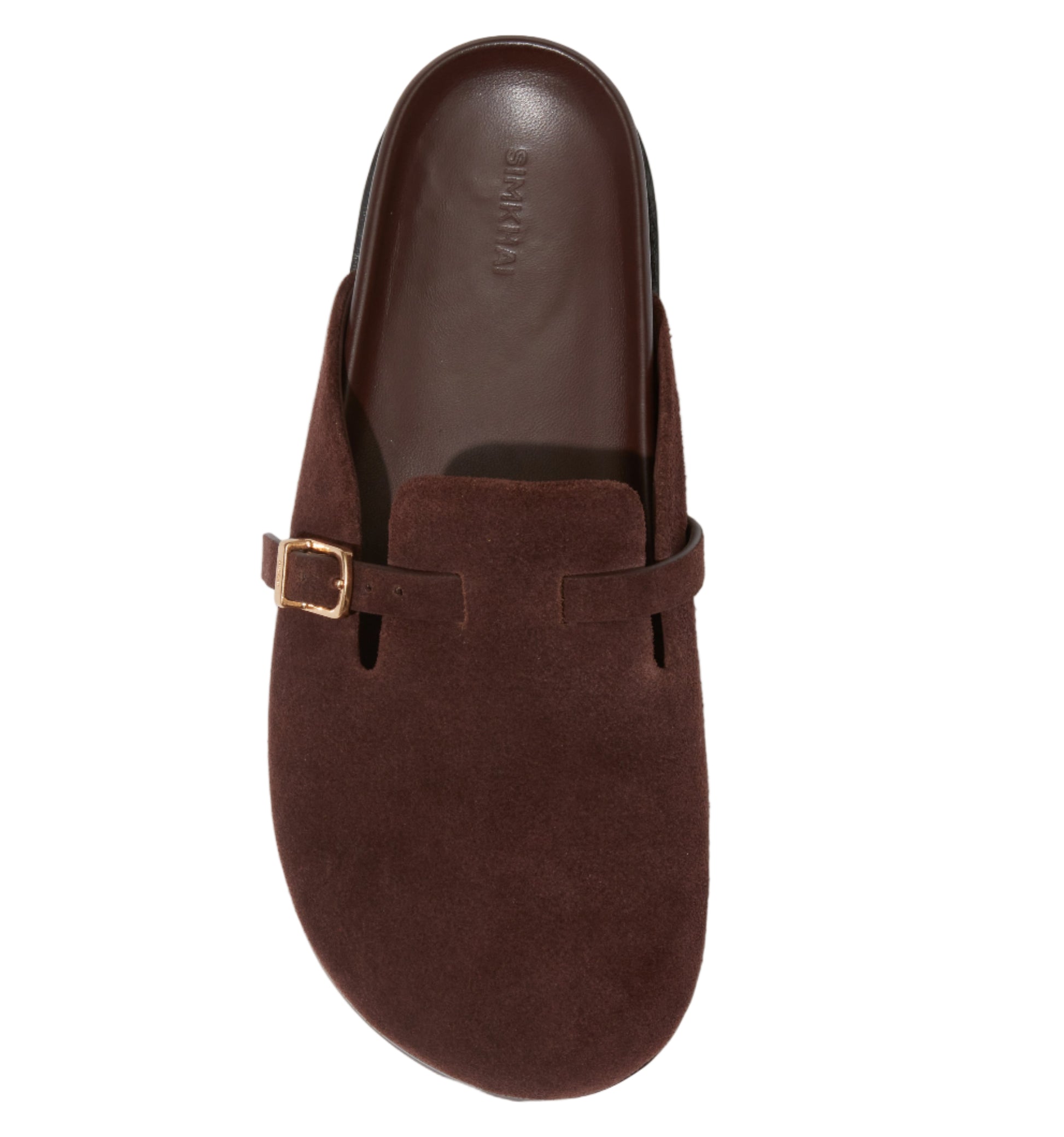 The Simkhai Adara Buckle Suede Slipper is a brown, closed-toe slide clog with an adjustable buckle strap and comfy footbed, shown from above against a white background.