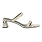 The Simkhai Clara Snake Block Heel features white and gray snakeskin-patterned double straps, a chunky textured leather block heel, and a squared toe, shown in side profile against a white background.