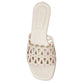 The McCall Laser Cut Flat Slide by Simkhai is an off-white leather slip-on sandal with a scalloped, cut-out strap and square toe.