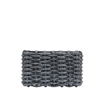 The Simkhai Morgan Clutch, a rectangular woven purse adorned with a metallic gray beaded design that echoes Simkhai’s elegant aesthetic, is displayed against a plain white background.