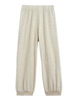 Suzie Kondi's Tosk Harem Pants in light grey, crafted from beach-ready terry with an elastic waistband and cuffs, are shown against a white background.