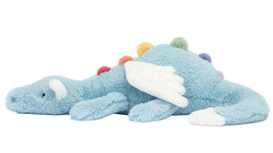 Sky Dragon by Jellycat lounges on its side, white wings outstretched and colorful spikes along its back—a charming midnight companion for mountaintop campers.