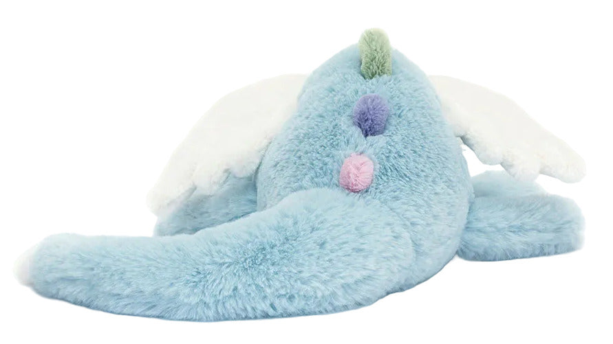 The Jellycat Sky Dragon is a light blue plush with a long tail, white wings, pastel pom-poms on its back, and a green tuft—ideal for midnight storytelling or as a cozy companion for camping adventures.