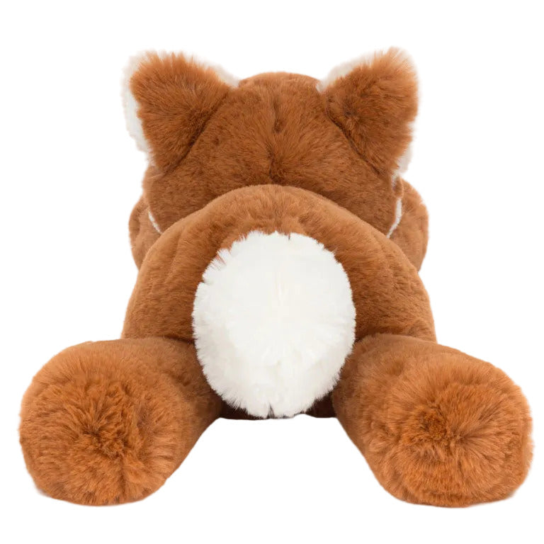 The Jellycat Smudge Fox, a brown plush toy with a white, fluffy tail, is lying face down and viewed from behind against a white background.