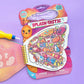 The Splash-Tastic Butterfly by Bright Stripes is a children's butterfly-themed magic water coloring activity book with a refillable water pen, displayed on a purple surface. This no-mess activity pad reveals hidden images of butterflies when wet, making it perfect for creative fun without the cleanup.