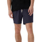 A person wearing navy blue Onia Land to Water Short 6" with four-way stretch and a black shirt, shown from the waist down against a plain background.