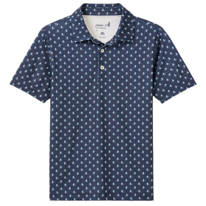 The Johnnie-O Boys' Performance Jersey Jr. Polo - For The Birdies Print is a cool, comfortable navy blue shirt with a white palm tree pattern, classic collar, three buttons, and lightweight fabric for all-day wear.