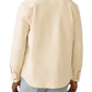 A person shown from the back wears the Faherty Sunwashed Canvas CPO in light beige and light gray pants.