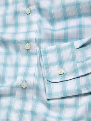 Close-up of The Movement Shirt by Faherty, showcasing a light blue and white plaid design with white buttons and neatly folded cuffs, crafted from soft Supima Cotton.