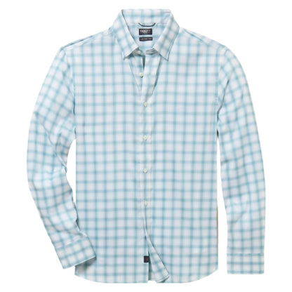 The Movement Shirt by Faherty is a light blue and white plaid button-up crafted from Supima cotton, featuring long sleeves, buttons, and a classic collar.