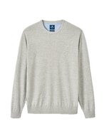The Albus Crew by Johnnie-O is an ultrasoft, light gray crewneck sweater featuring long sleeves, ribbed cuffs, and a ribbed hem. Shown flat against a white background, it’s the ideal lightweight layer for everyday wear.