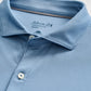 Light blue Johnnie-O Birdie Polo in size medium, shown folded with three buttons fastened and collar neatly arranged. Crafted from lightweight, moisture-wicking fabric with UPF 50 protection for all-day comfort and style.