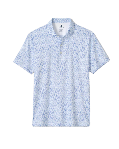 The Johnnie-O Marietta Polo is a light blue, short-sleeve featherweight shirt with a subtle small floral print, featuring a buttoned neckline and a classic collar. Displayed on a white background, this stylish piece combines the lightweight comfort of modern design with the timeless appeal of classic performance polos.