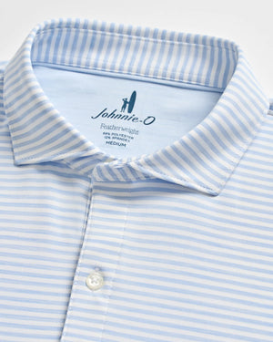 Close-up of a light blue and white striped collared shirt with buttons, featuring the Johnnie-O brand label and size details inside the collar—crafted in the signature performance style of the Johnnie-O Seymour Polo for enhanced comfort and sun protection.