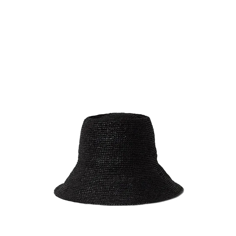 The Felix Hat by Janessa Leone, a black woven bucket hat ideal for summer, is shown against a white background.