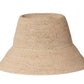 The Felix Hat by Janessa Leone is a light brown raffia straw bucket hat featuring a wide, downward-sloping brim, ideal for summer.