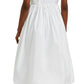 A person in Erdem's Short Sleeve Embroidered Shirt Dress, featuring an A-line silhouette and gathered waist, paired with black shoes, stands gracefully against a plain background.