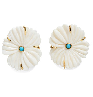 The New Bloom Studs by Lizzie Fortunato feature round, white mother-of-pearl earrings with gold prongs and a small turquoise stone in the center of each.
