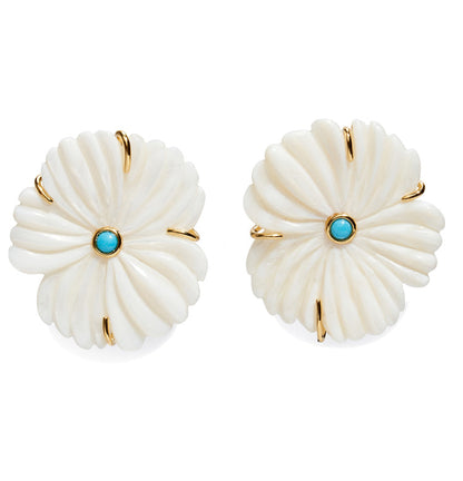 The New Bloom Studs by Lizzie Fortunato feature round, white mother-of-pearl earrings with gold prongs and a small turquoise stone in the center of each.