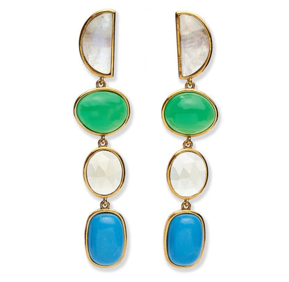 The Cala Drop Earrings by Lizzie Fortunato showcase statement gold-plated brass frames adorned with a half-moon moonstone, green oval stone, faceted white oval stone, and blue rectangular stone.