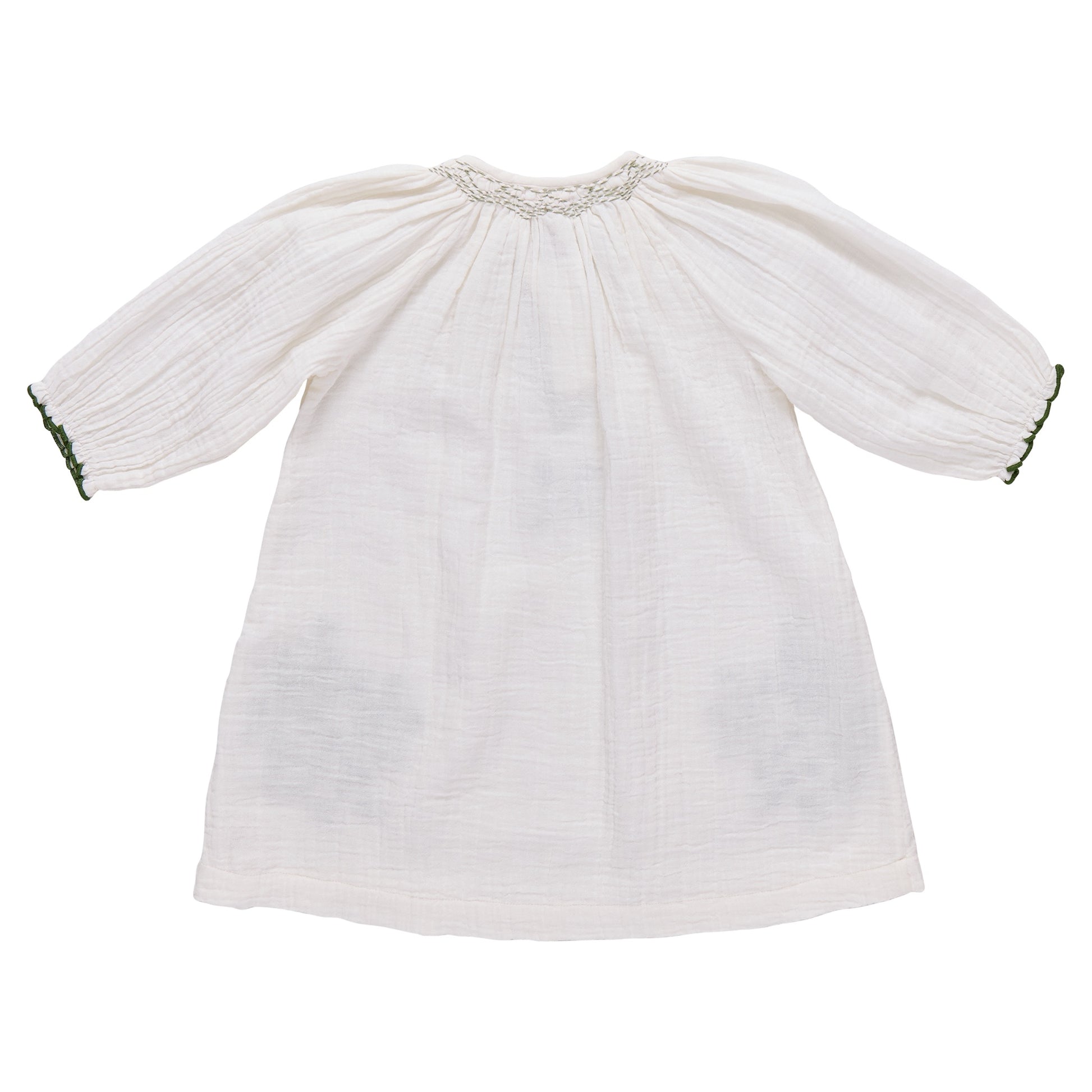 The Pink Chicken Girls' Ava Dress features soft cotton gauze, a gathered neckline, dark cuff trim, and green embroidery. Shown laid flat on a white background.