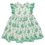 The Pink Chicken Girls' Cynthia Dress features green floral embroidery, short ruffled sleeves, and a scalloped hem—an adorable white spring dress for babies, perfect for any occasion.