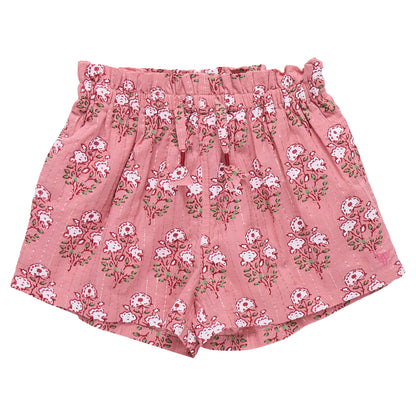 The Girls' Theodore Short by Pink Chicken features a charming white floral block print and an elastic waistband.