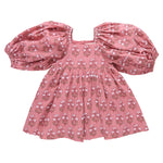 The Girls' Mary Barrett Dress by Pink Chicken features pink strawflower print, puffed short sleeves, a square neckline, and a gathered skirt—perfect as a twirl dress for girls.