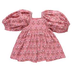 The Girls' Mary Barrett Dress by Pink Chicken features pink strawflower print, puffed short sleeves, a square neckline, and a gathered skirt—perfect as a twirl dress for girls.