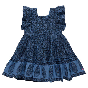 The Pink Chicken Girls' Elsie Dress features a blue Navy Garden Floral block print, ruffled short sleeves, and a flared, tiered skirt with charming floral and leaf designs.