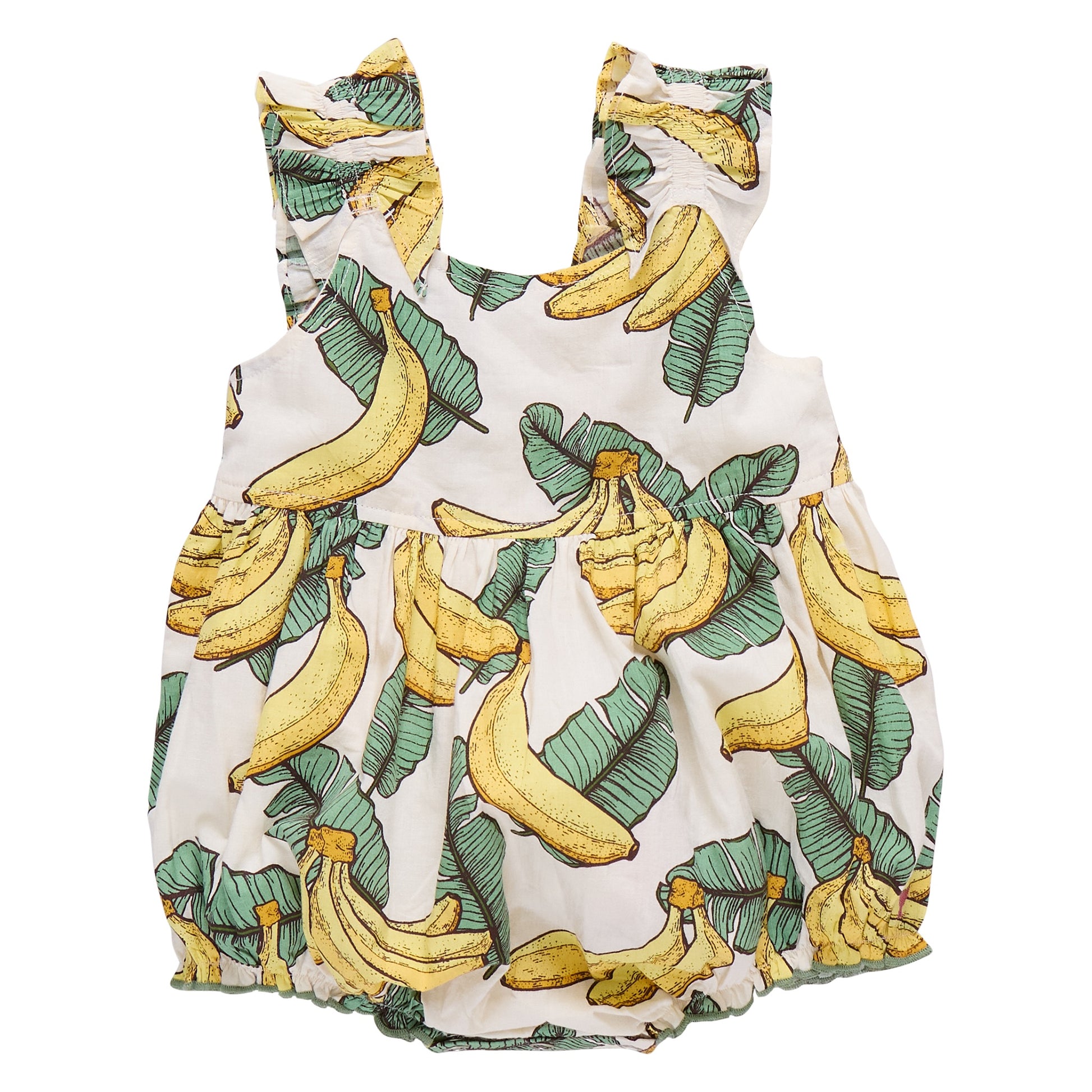 The Pink Chicken Baby Girls' Via Bubble is crafted from soft cotton cambric and features a playful yellow banana and lush green leaf print on a crisp white background.