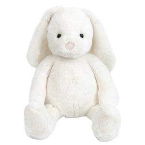 The Mon Ami Magnolia Bunny - Cream features long floppy ears, black eyes, and a pink nose. This plush toy sits upright against a white background—perfect as an Easter gift.