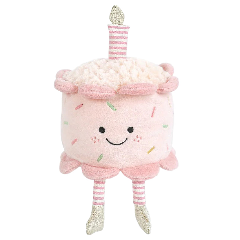 Celebrate with Mon Ami’s Birthday Cake - Pink, a plush shaped like a smiling pink cake, topped with a pink striped candle and featuring pink striped legs with silver shoes. This cuddly treat makes every birthday extra sweet!.