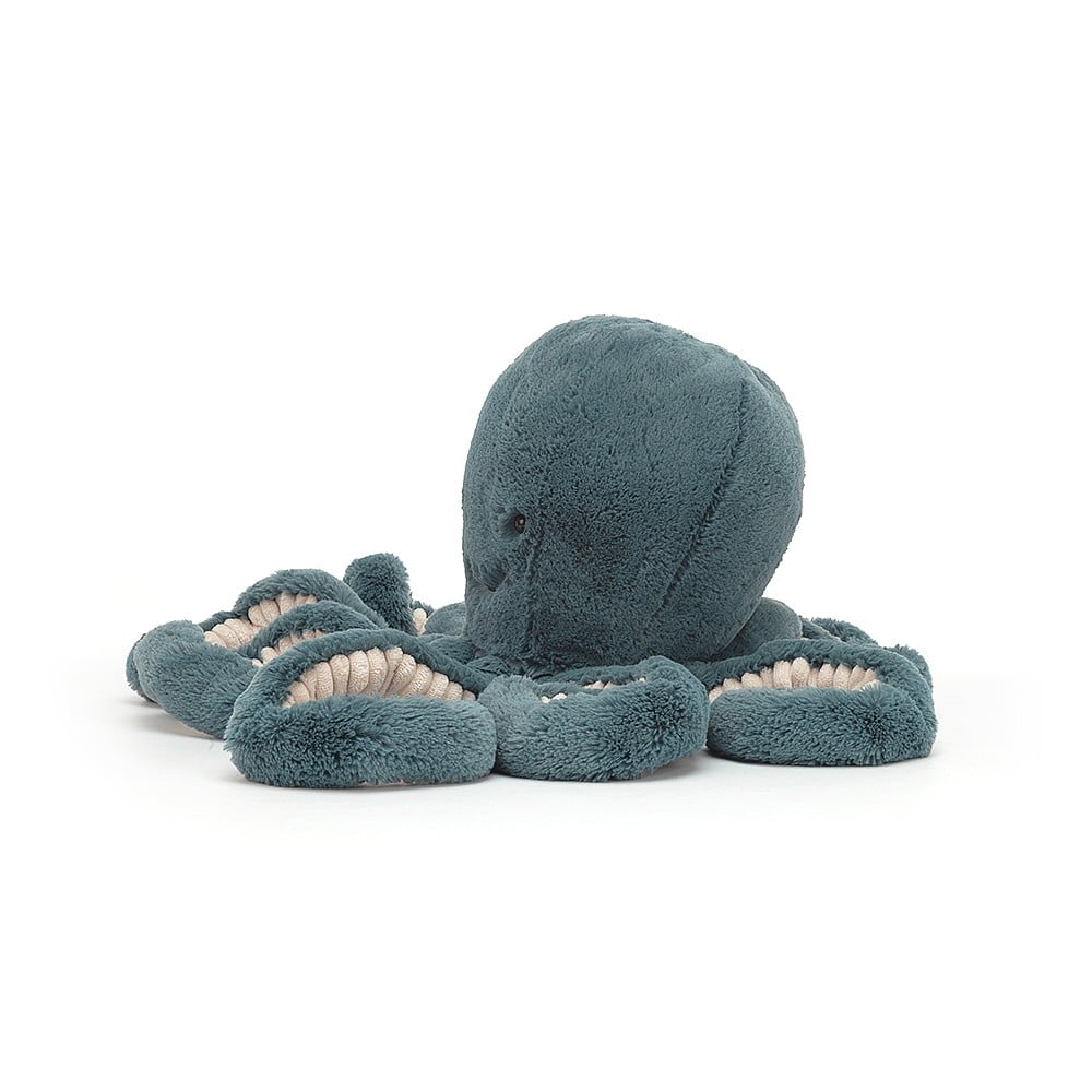 Blue Storm Octopus, a blue stuffed animal on a white background.