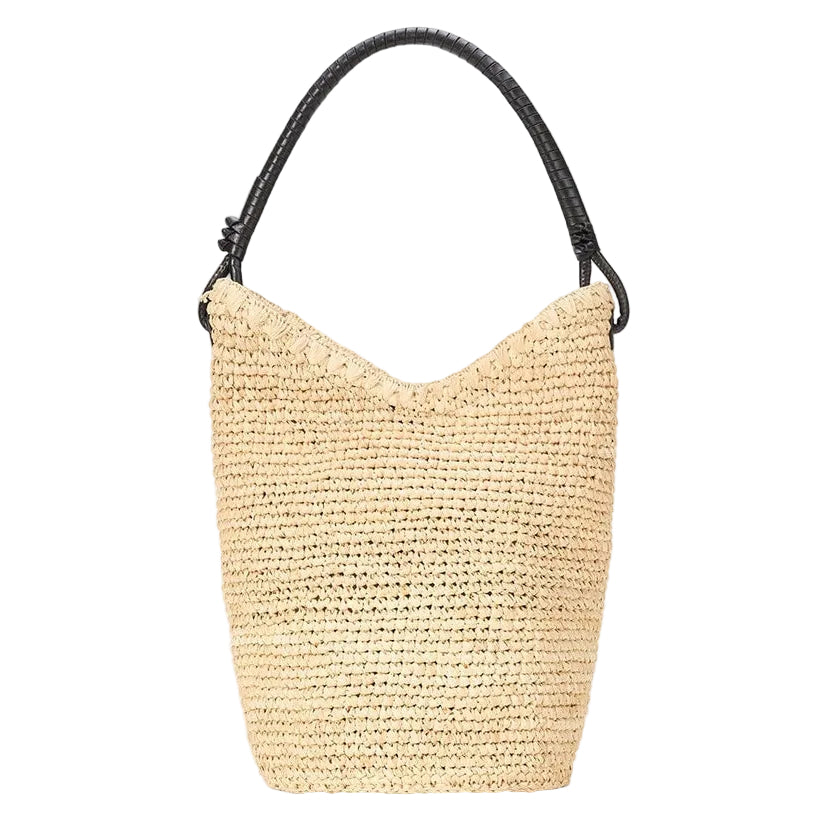 The Staud Lani Raffia Bucket Bag features beige raffia with a black leather handle, showcased on a white background—an everyday essential for effortless style.
