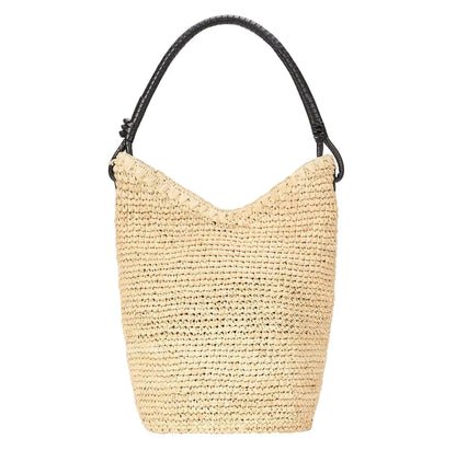 The Staud Lani Raffia Bucket Bag features beige raffia with a black leather handle, showcased on a white background—an everyday essential for effortless style.