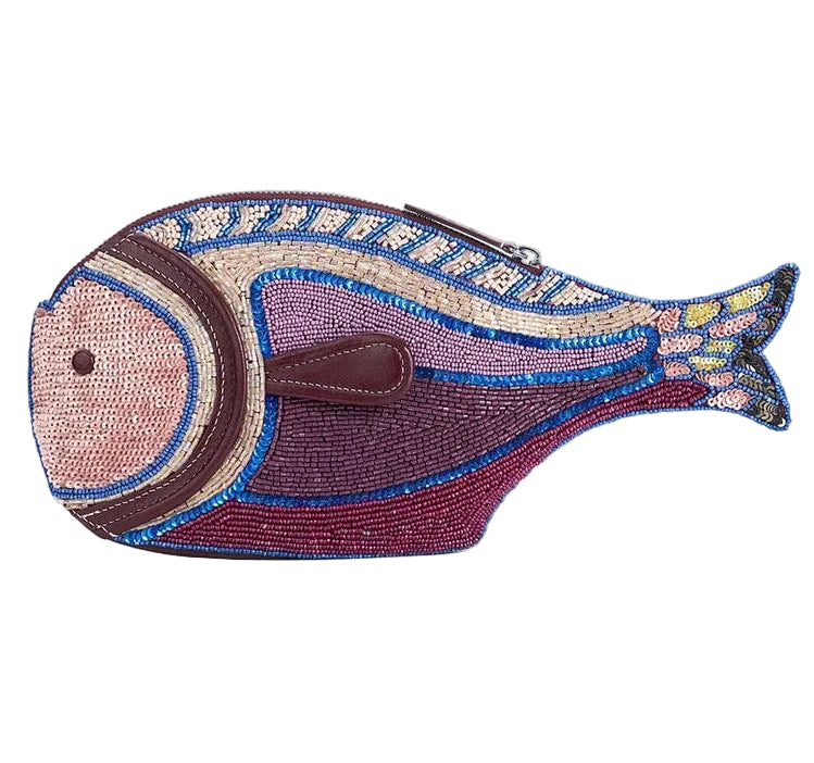 The Pesce Clutch by Staud is a beaded purse shaped like a fish, featuring pink, purple, blue, and gold patterns with a top zip closure.