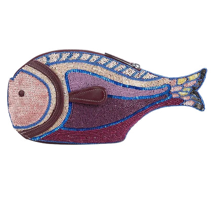 The Pesce Clutch by Staud is a beaded purse shaped like a fish, featuring pink, purple, blue, and gold patterns with a top zip closure.